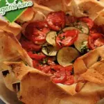 Ricette light Verdure - Ricetta torta salata di zucchine e pomodori: ricetta vegetariana da 160 calorie 