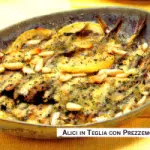Ricetta alici (o acciughe) al forno con pinoli, olive, prezzemolo, pangrattato: secondo piatto dietetico pesce