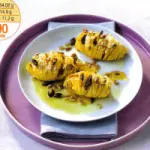 Contorni dietetici di verdure: ricetta ventagli di patate gratinate al forno con semi e pinoli. Piatto da 390 calorie