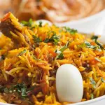Ricetta biryani di riso con agnello o pollo