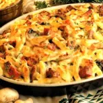 Ricetta pasta gratinata al forno con prosciutto cotto, funghi, panna