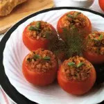 Ricetta pomodori ripieni al forno con acciughe sott' olio, mollica di pane, parmigiano