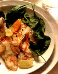 Ricetta filetti di pesce con succo di limone, spicchi d' arancia e lime
