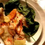 Ricetta filetti di pesce con succo di limone, spicchi d' arancia e lime